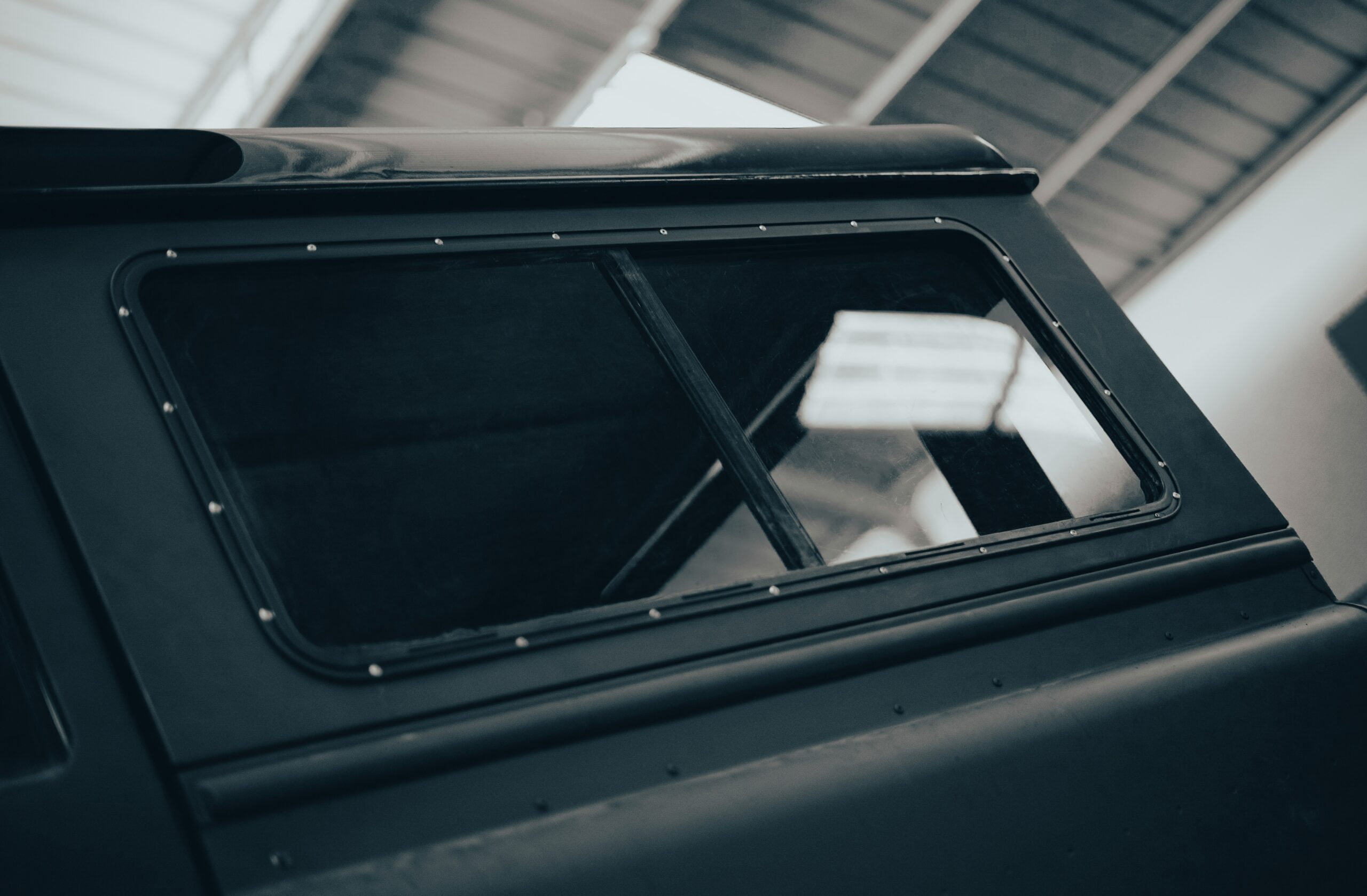a black car with a broken window
